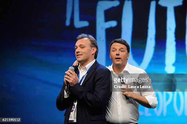 Italian Prime Minister Matteo Renzi and italian politician Matteo Richetti speak during the meeting of the Leopolda 2016 on November 4, 2016 in...