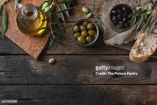 olives with bread and oil - hessian stock pictures, royalty-free photos & images