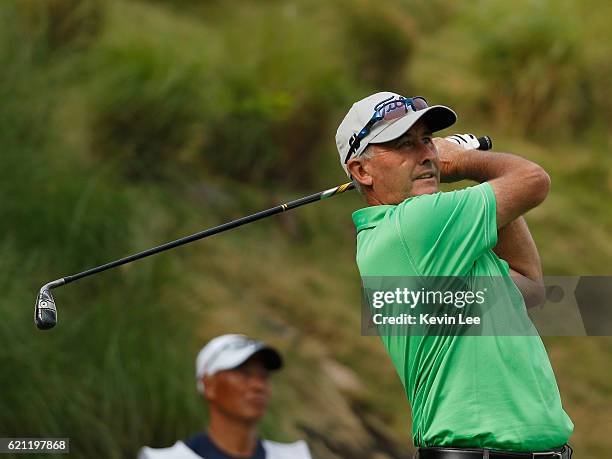 David McKenzie of Australia tees off at 1st green during day three of the Clearwater Bay Open at the Clearwater Bay Golf & Country Club on November...
