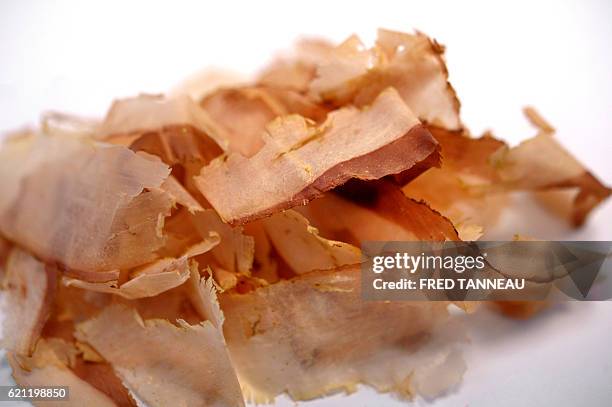 Dried bonito flakes are pictured October 21, 2016 in Concarneau, western France, at the Makurazaki France katsuobushi firm. They came from Japan to...