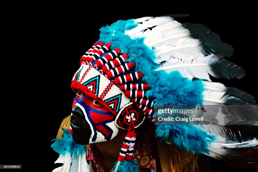 A Mexican dressed in traditional Indian costume during a parade celebrating the anniversary of the city - SAN MIGUEL DE ALLENDE, MEXICO