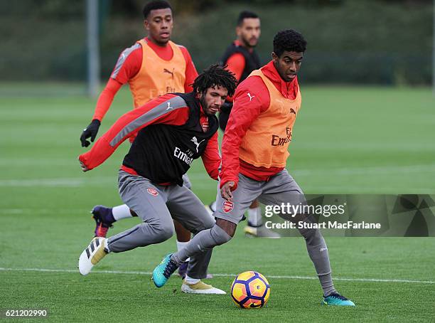 Mohamed Elneny and Gedion Zelalem of Arsenal during a training session at London Colney on November 5, 2016 in St Albans, England.