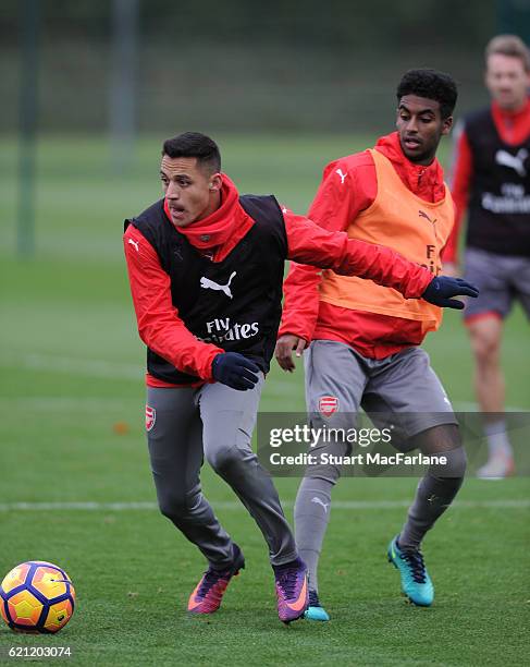 Alexis Sanxhez and Gedion Zelalem of Arsenal during a training session at London Colney on November 5, 2016 in St Albans, England.