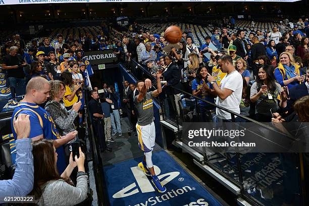 Stephen Curry of the Golden State Warriors takes a shot from the tunnel before the game against the Oklahoma City Thunder on November 3, 2016 at...