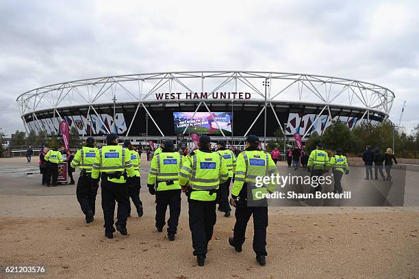 Policing measures are seen outside the stadium prior to the Premier League match between West Ham United and Stoke City at Olympic Stadium on...