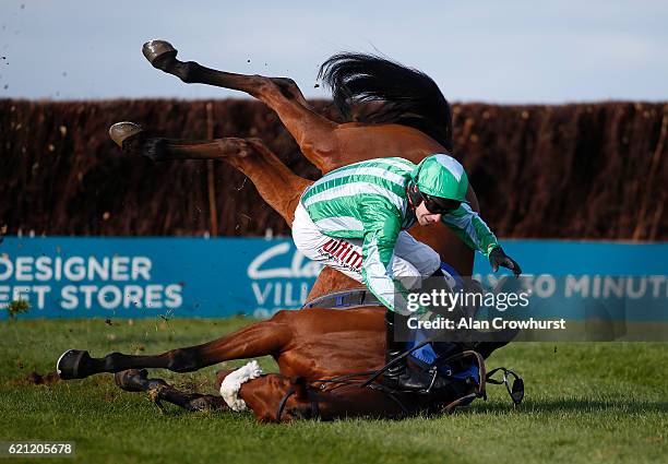 Wayne Hutchinson falls from Shantou Village at Wincanton Racecourse on November 5, 2016 in Wincanton, England.