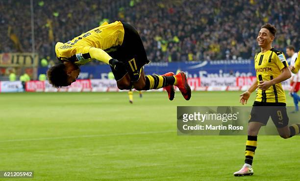 Pierre Aubameyang of Dortmund celebrates after scoring the opening goal during the Bundesliga match between Hamburger SV and Borussia Dortmund at...