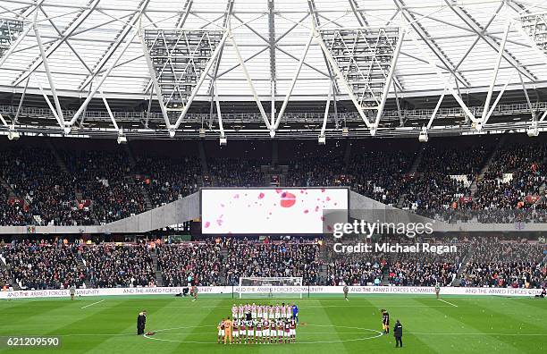 General view inside the stadium, the Stoke City and West Ham United teams take part in a minutes silence in honour of Remembrance Day prior to kick...