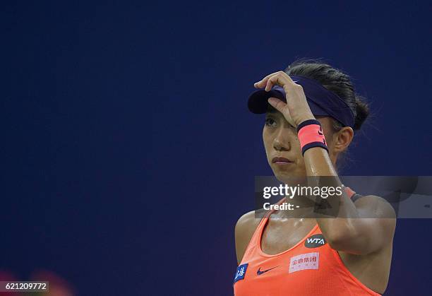 Zhang Shuai of China reacts during the singles semi-final match against Petra Kvitova of the Czech Republic during their women's singles semi-final...