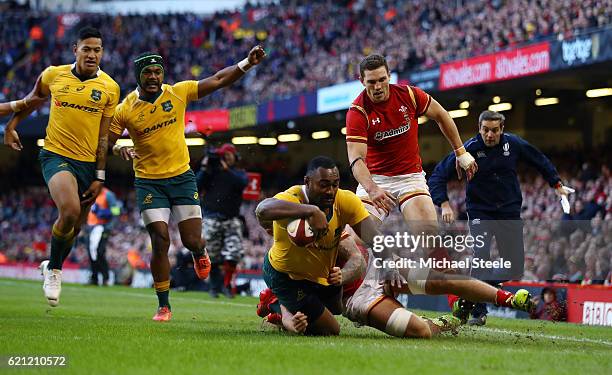 Tevita Kuridrani of Australia powers over to score his team's third try during the international match between Wales and Australia at the...