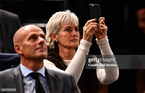 Judy Murray watches as her son Andy Murray of Great Britain is named world number one following a walkover in the Mens Singles semi final against...