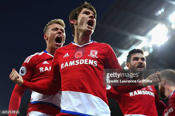Marten de Roon of Middlesbrough celebrates scoring his sides first goal during the Premier League match between Manchester City and Middlesbrough at...