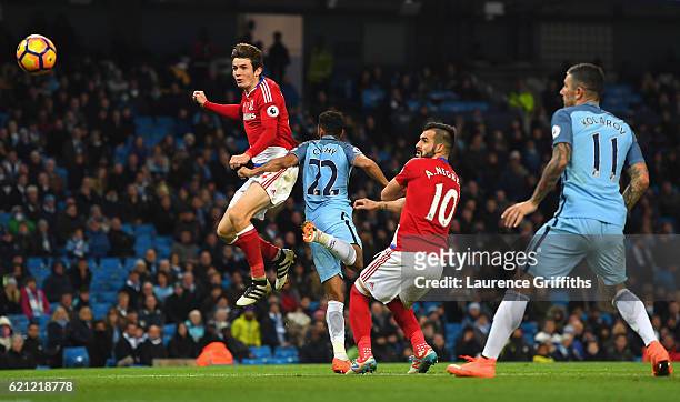 Marten de Roon of Middlesbrough scores his sides first goal during the Premier League match between Manchester City and Middlesbrough at Etihad...