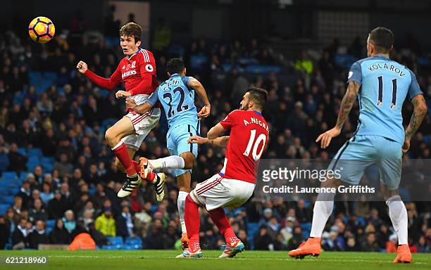 Marten de Roon of Middlesbrough scores his sides first goal during the Premier League match between Manchester City and Middlesbrough at Etihad...