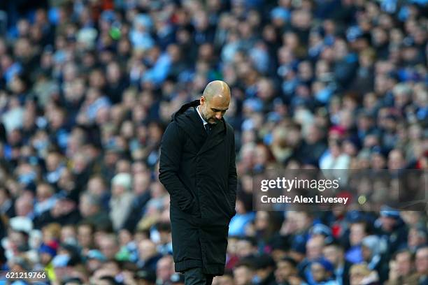 Josep Guardiola, Manager of Manchester City reacts to Middlesbrough scoring during the Premier League match between Manchester City and Middlesbrough...