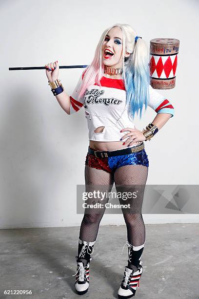 Cosplayer dressed with a costume of the character Harley Quinn inspired by the Batman univers poses during the Paris Manga & Sci-Fi Show at Parc des...