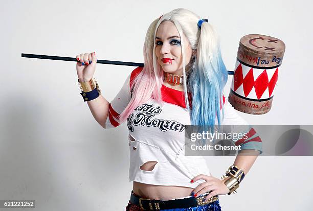 Cosplayer dressed with a costume of the character Harley Quinn inspired by the Batman univers poses during the Paris Manga & Sci-Fi Show at Parc des...
