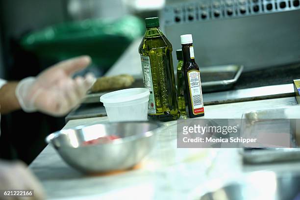 View of Pampeian olive oil and A1 Original Sauce being used in the kitchen at the Food Network Magazine Cooking School 2016 at The International...