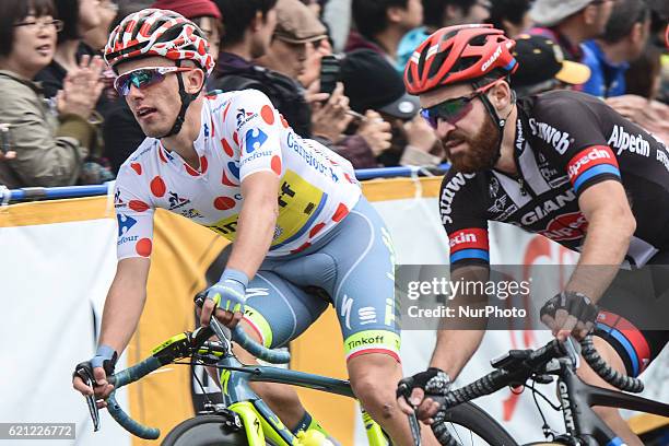 Rafal Majka and Simon Geschke, seen inside the pelton during the main Race, a 57km on a circuit , at the fouth edition of the Tour de France Saitama...