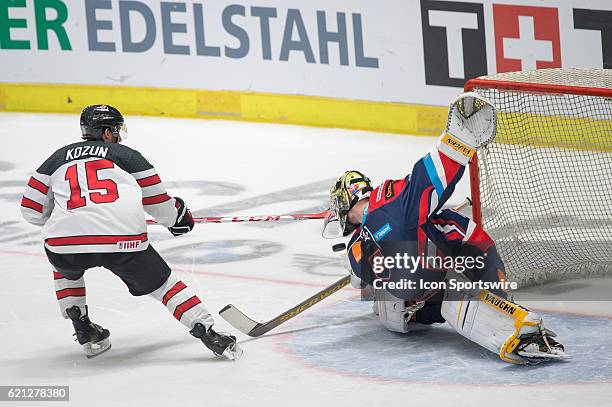 Brandon Kozun tries to score against Goalie Jaroslav Janus in penalty shoot out during the Deutschland Cup between Slovakia and Canada on 5 November,...