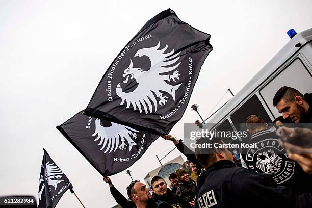 Right-wing activists gather in front of Hauptbahnhof main railway station before marching through the city center on November 5, 2016 in Berlin,...