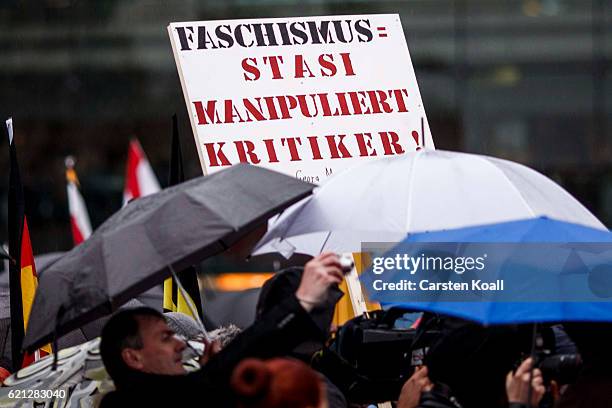 Right-wing activists gather in front of Hauptbahnhof main railway station before marching through the city center on November 5, 2016 in Berlin,...