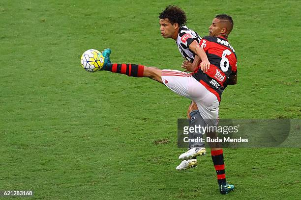 Jorge of Flamengo struggles for the ball with Camilo of Botafogo during a match between Flamengo and Botafogo as part of Brasileirao Series A 2016 at...