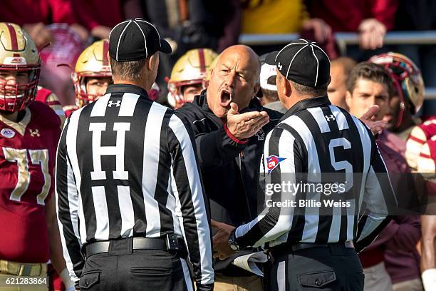 Head coach Steve Addazio of Boston College argues with the officials during the first quarter of game against Louisville at Alumni Stadium on...