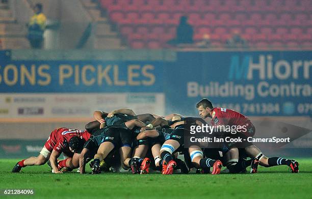Scarlets' Jonathan Evans places the ball into the scrum during the Guinness PRO12 Round 8 match between Scarlets and Glasgow Warriors at Parc y...