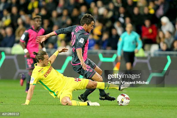 Oscar Trejo of Toulouse and Guillaume Gillet of Nantes during the Ligue 1 match between Fc Nantes and Toulouse Fc at Stade de la Beaujoire on...