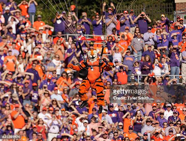 The Clemson Tiger mascot parachutes into the stadium prior to the game against the Syracuse Orange at Memorial Stadium on November 5, 2016 in...