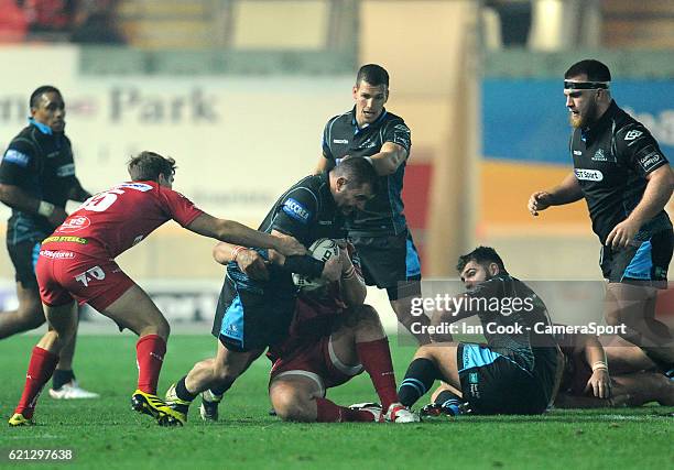 No way through for Glasgow Warriors' Corey Flynn during the Guinness PRO12 Round 8 match between Scarlets and Glasgow Warriors at Parc y Scarlets on...