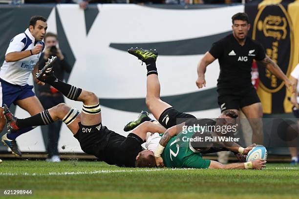 Robbie Henshaw of Ireland crashes over to score his team's fifth try during the international match between Ireland and New Zealand at Soldier Field...