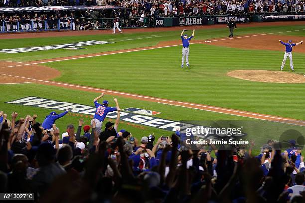 The Chicago Cubs celebrate after defeating the Cleveland Indians 8-7 in Game Seven of the 2016 World Series at Progressive Field on November 2, 2016...