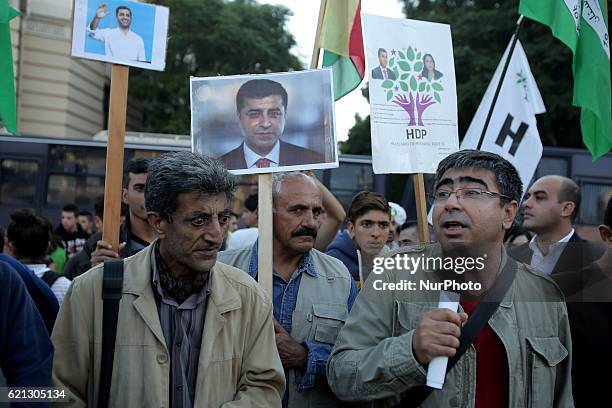 Kurds participate to a protest rally close to the Turkish embassy in Athens, holding photos of Selahattin Demirtas, arrested leader of Peoples'...