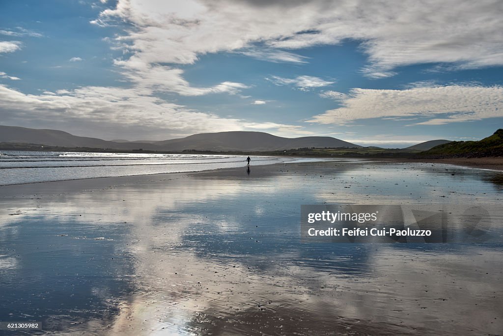 One person walking on the beach of Waterville in Ireland