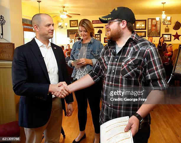 Independent presidential candidate Evan McMullin talks to a veteran at the Brick House Cafe on November 5, 2016 in Cedar City, Utah. McMullin is...
