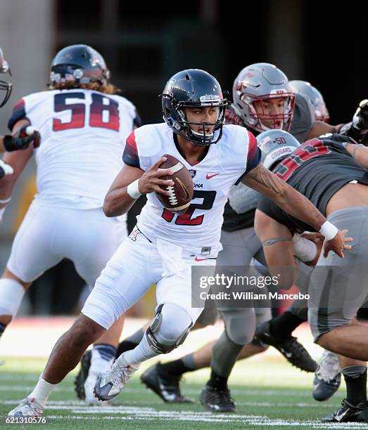 Quarterback Anu Solomon of the Arizona Wildcats looks to pass against the Washington State Cougars in the first half at Martin Stadium on November 5,...