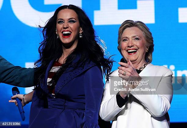 Democratic presidential nominee former Secretary of State Hillary Clinton appears on stage with recording artist Katy Perry during a get-out-the-vote...