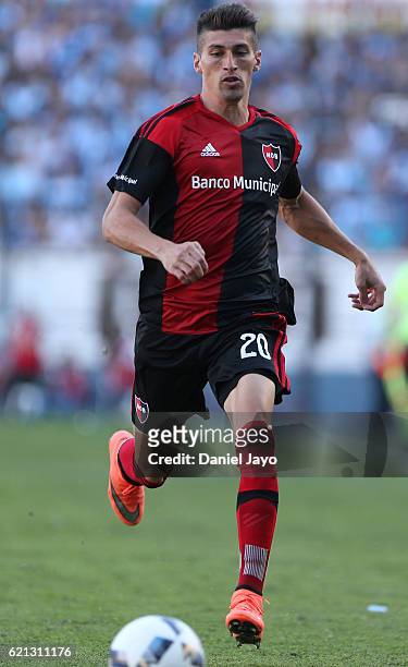 Joel Amoroso, of Newell's Old Boys, plays the ball during a match between Racing Club and Newell's Old Boys as part of Torneo Primera Division...