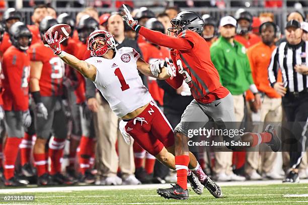 Jordan Westerkamp of the Nebraska Cornhuskers stretches to make a catch in the first quarter as he is defended by Gareon Conley of the Ohio State...