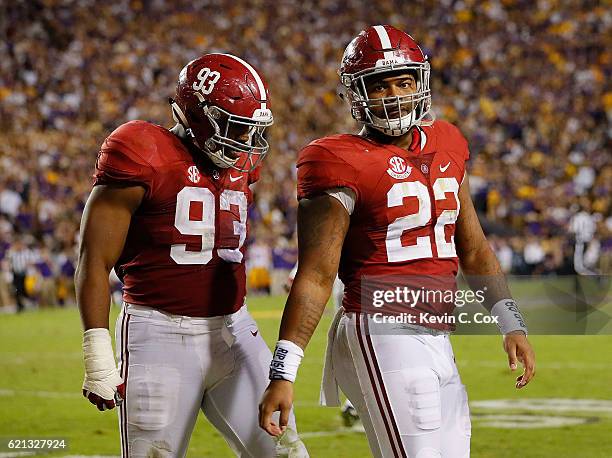 Ryan Anderson and Jonathan Allen of the Alabama Crimson Tide react after Anderson forced an interception by Danny Etling of the LSU Tigers at Tiger...