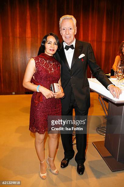 German autir Egon F. Freiheit and his girlfriend Amira attend the 23rd Opera Gala at Deutsche Oper Berlin on November 5, 2016 in Berlin, Germany.