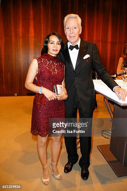 German autir Egon F. Freiheit and his girlfriend Amira attend the 23rd Opera Gala at Deutsche Oper Berlin on November 5, 2016 in Berlin, Germany.