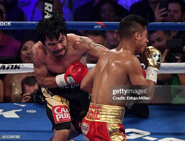 Manny Pacquiao knocks Jessie Vargas down with a left in the second round of their WBO welterweight championship fight at the Thomas & Mack Center on...