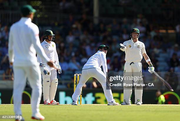 Steve Smith of Australia speaks to Faf du Plessis of South Africa after Dean Elgar of South Africa after having words with Dean Elgar of South Africa...