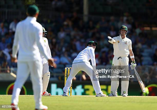 Steve Smith of Australia speaks to Faf du Plessis of South Africa after Dean Elgar of South Africa after having words with Dean Elgar of South Africa...