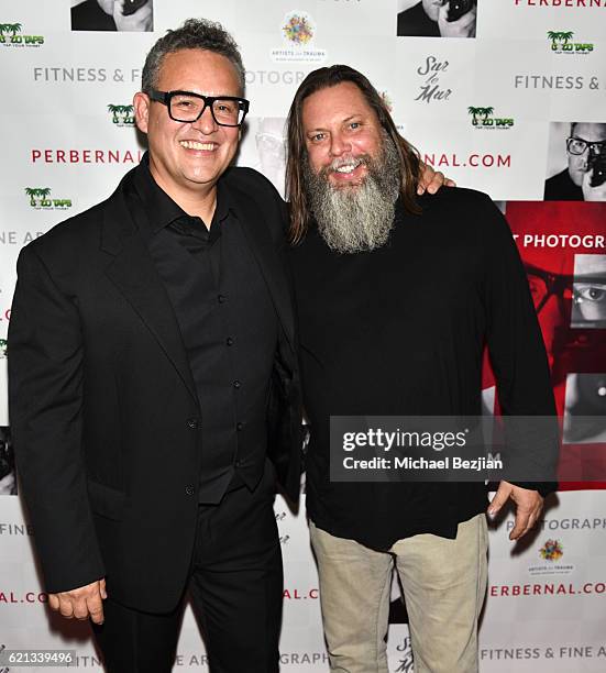 Artist Per Bernal and artist Kelly "Risk" Graval arrive at Sur Le Mur presents The Premiere Opening of Per Bernal's Fine Art Photography Studio In...