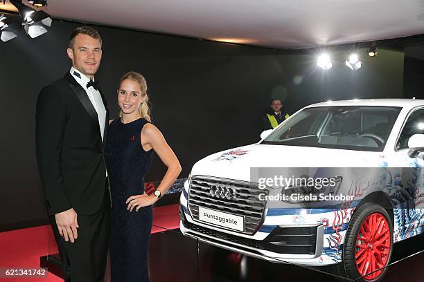 Manuel Neuer, goal keeper FC Bayern Munich and his girlfriend Nina Weiss during the 23rd Opera Gala benefit to 'Deutsche AIDS-Stiftung' at Deutsche...