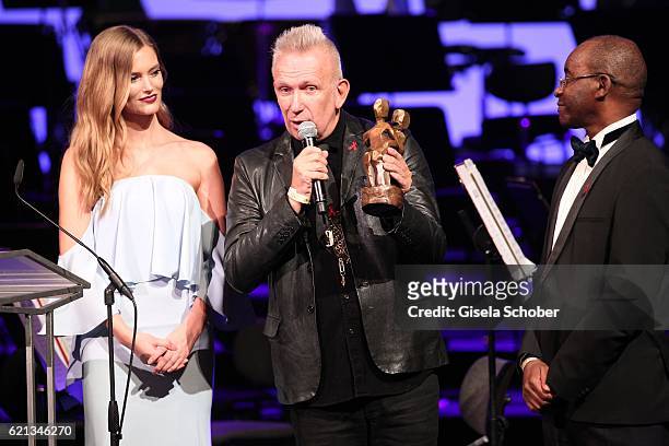 Charlott Cordes, Fashion Designer Jean Paul Gaultier with 'World without AIDS' Award and Strive Masiyiwa during the 23rd Opera Gala at Deutsche Oper...
